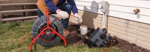 45th Parallel Home Inspections performing a sewer scope as part of a sewer line inspection and home inspection.