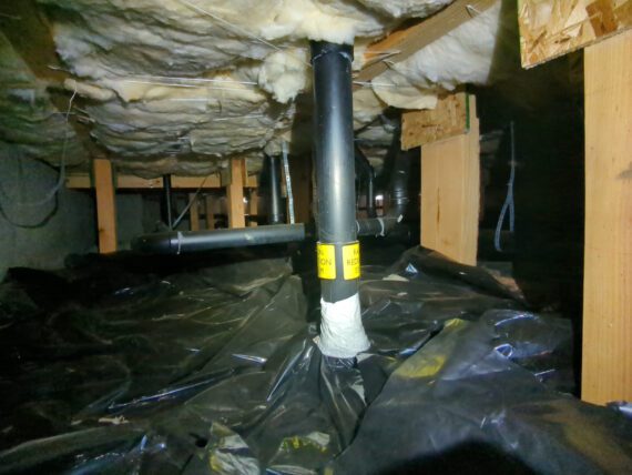 Radon resistant piping in the crawlspace of a home to help illustrate home inspection services in Ridgefield.